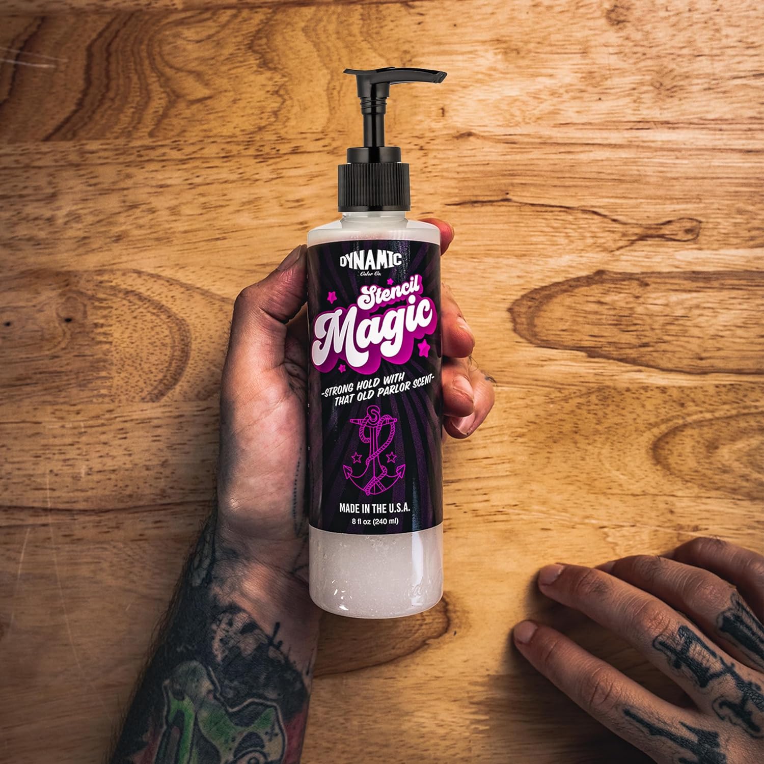 Dynamic Stencil Magic 8oz tattoo stencil application solution bottle in hands