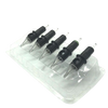 Close-up of disposable tattoo cartridge tray holding 5 cartridges