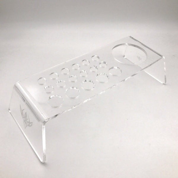 Soporte acrílico para vasos y tapas de tinta.